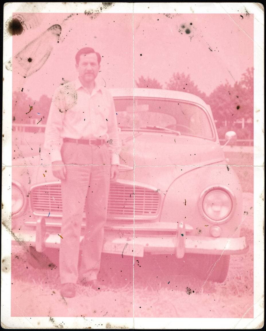 Sun-bleached 1970s car photo with completely washed out colors